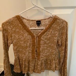 Brownish and white top message me if interested